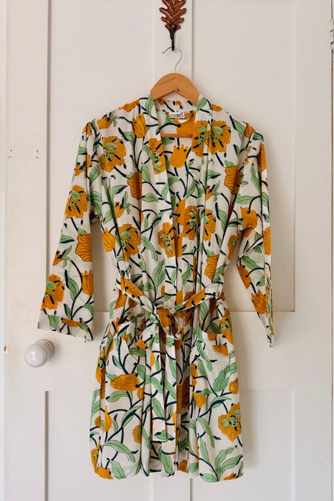 short kimono hanging on door hook in large scale floral print