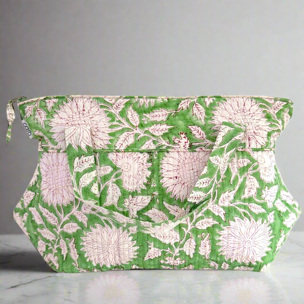 washbag with handles in green and white sunflower print 