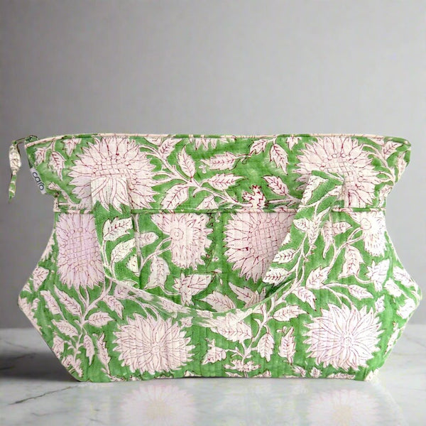 washbag with handles in green and white sunflower print 