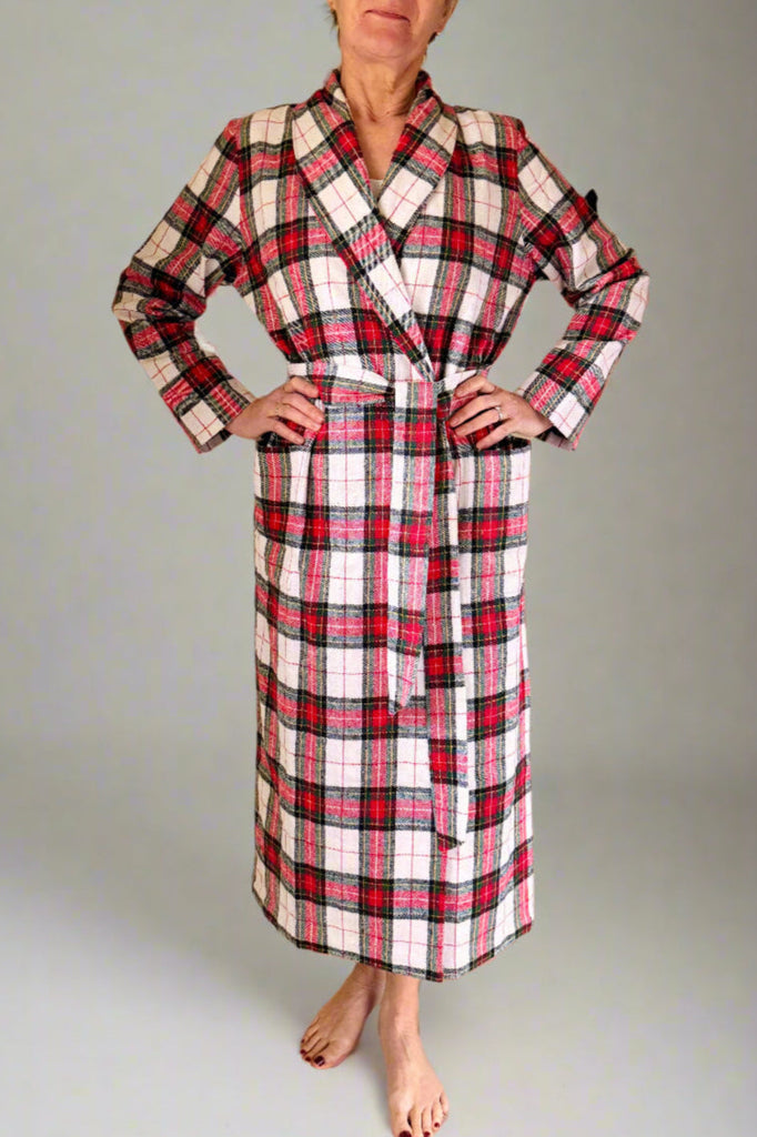 woman wearing white, red and black check winter dressing gown